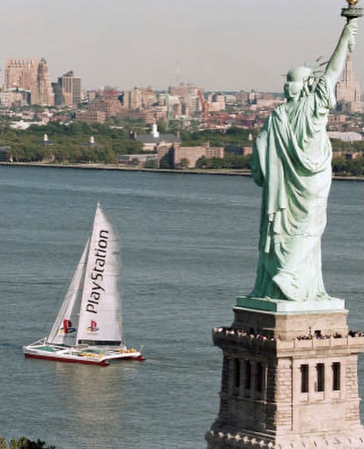 PlayStation catamaran passing the Statue of Liberty